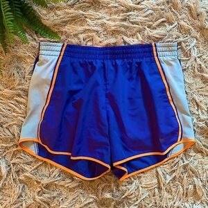 Nike blue with orange stripes running dri-fit shorts